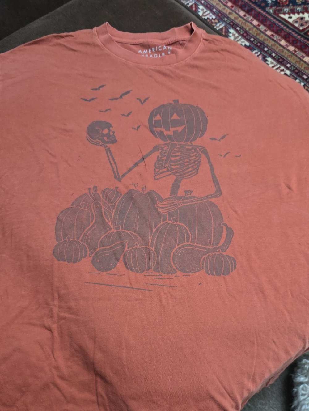 American Eagle Outfitters Pumpkin-Head Skeleton Graphic Tee - Rust